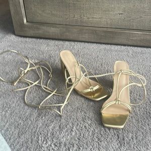 Gold lace up to knee heels